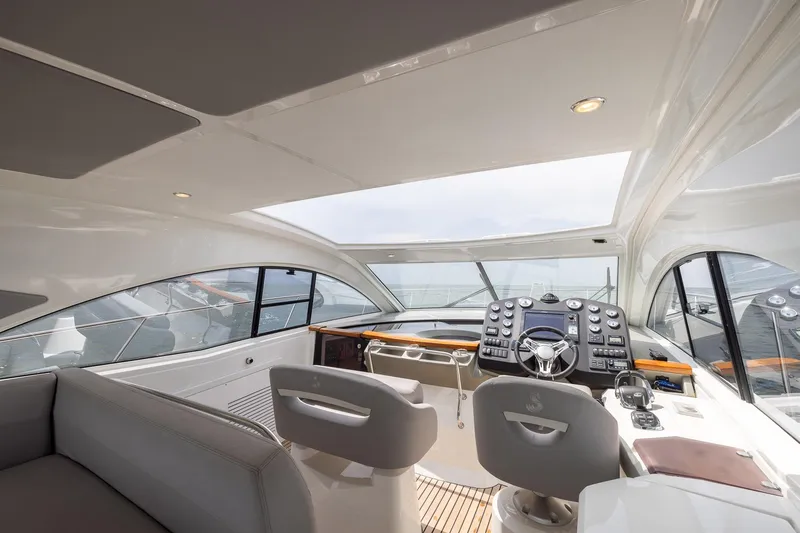 Slide: The Image of Luxurious interior of 2014 Beneteau Gran Turismo 44 yacht with modern helm and seating. - 8