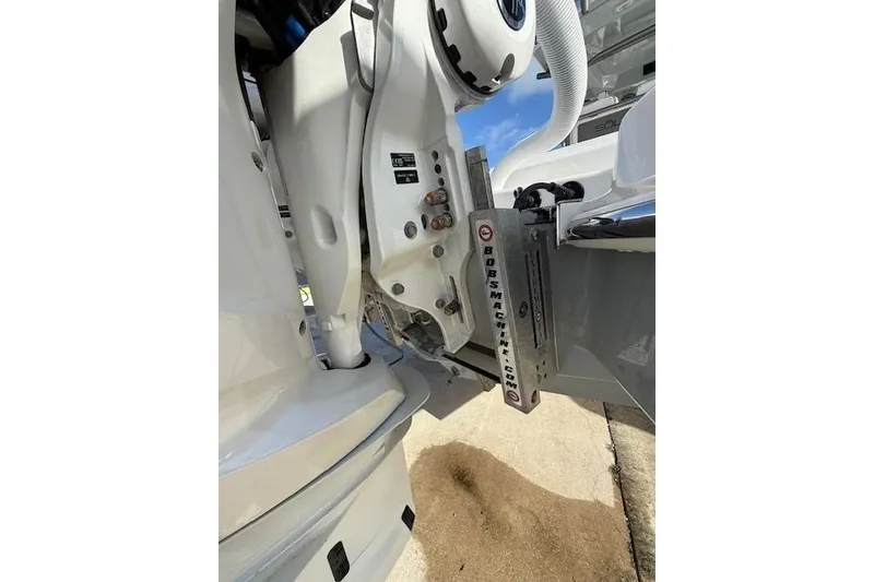 Slide: The Image of 2025 Solace 28HCS boat engine detail with Bob's Machine bracket. - 6