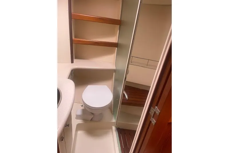 Slide: The Image of Bathroom interior of 2007 Marlow-Hunter 45CC yacht with toilet and shower. - 5