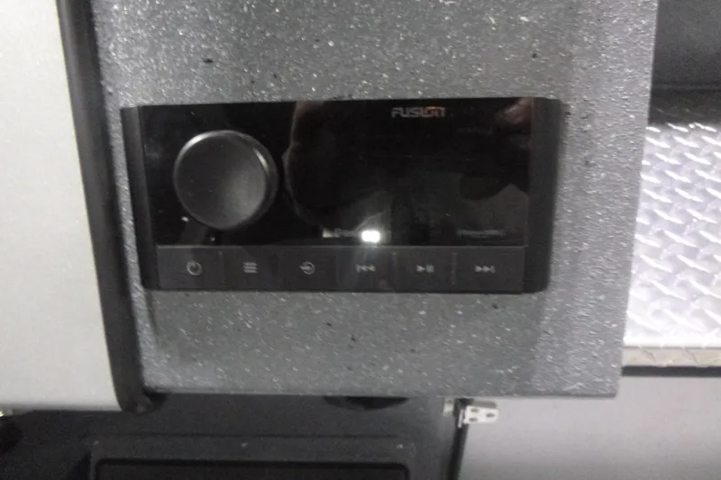 Slide: The Image of Audio control panel in 2026 KingFisher 2425 Escape HT boat interior. - 21