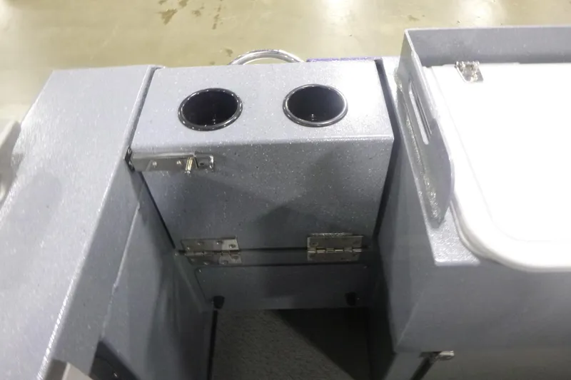 Slide: The Image of Interior of 2026 KingFisher 2425 Escape HT boat with cup holders and storage compartment. - 31