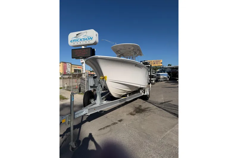 Slide: The Image of 2023 Sportsman Heritage 241 Center Console boat on trailer at Erickson Marine. - 3