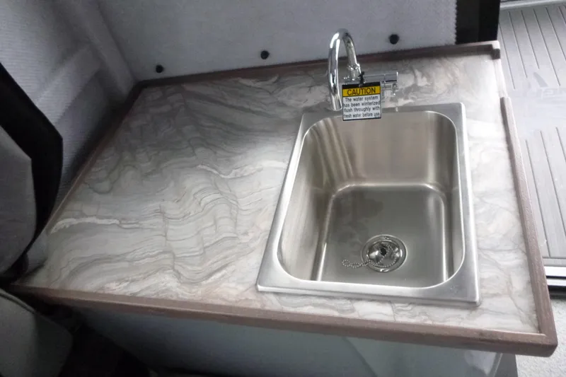 Slide: The Image of Stainless steel sink on marble countertop in 2026 KingFisher 25 XAC model. - 21