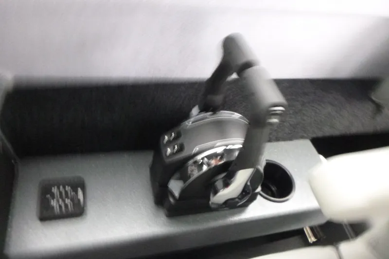 Slide: The Image of Control lever of 2026 KingFisher 25 XAC boat, featuring modern design and functionality. - 28