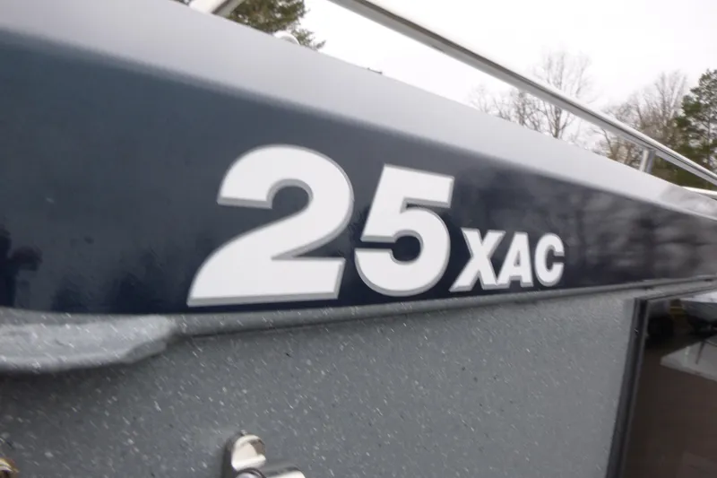 Slide: The Image of 2026 KingFisher 25 XAC boat model name on hull. - 9