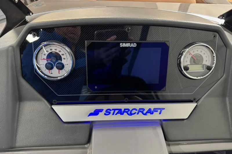 Slide: The Image of Dashboard of 2026 Starcraft SLS 3 Q DH boat with Simrad display and gauges. - 14