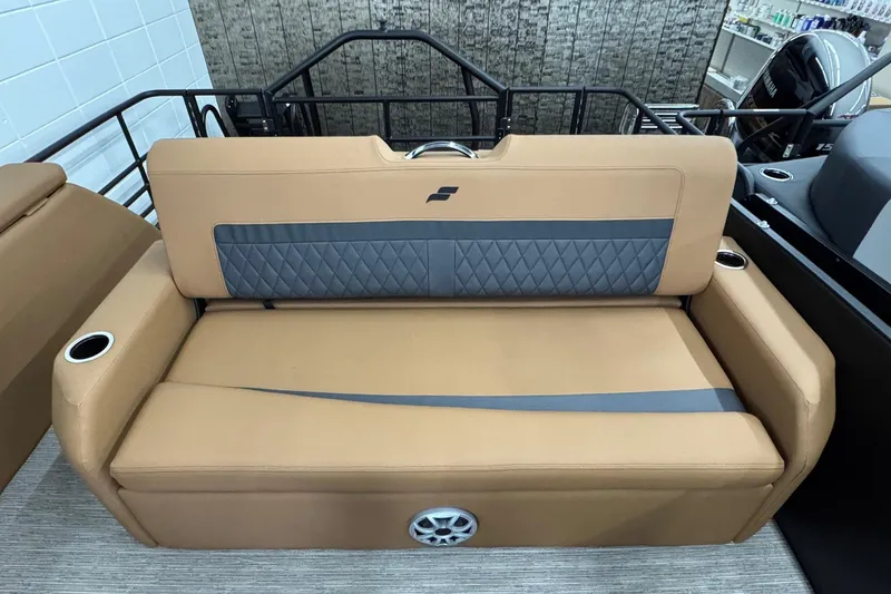 Slide: The Image of 2026 Starcraft SLS 3 Q DH boat seat, tan upholstery, diamond-patterned accents, cup holders. - 18