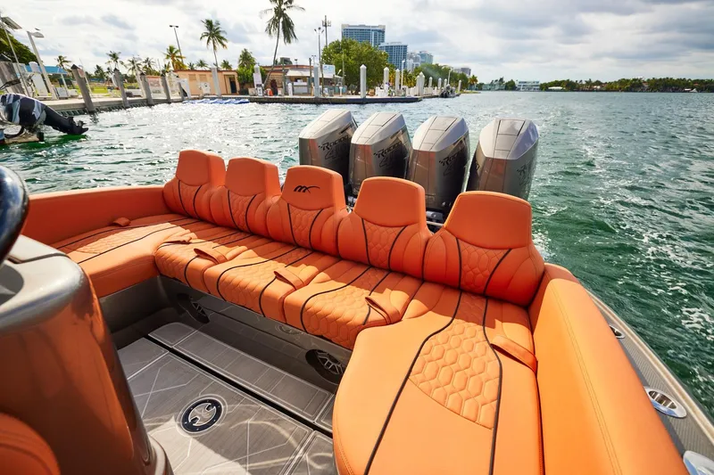 Slide: The Image of Luxurious orange seating on a Midnight Express 37' Open boat with powerful engines. - 15