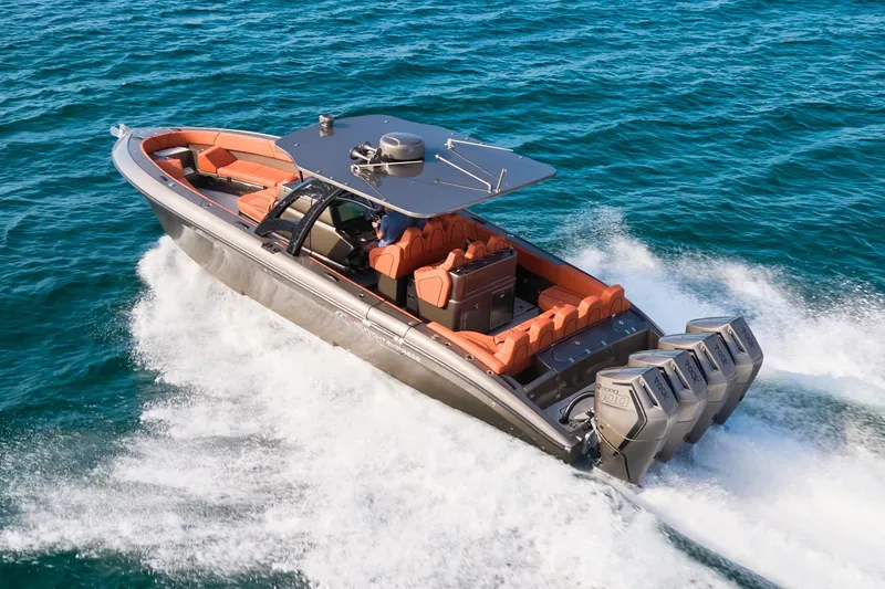 Slide: The Image of High-speed Midnight Express 37' Open boat cruising on ocean waters. - 3