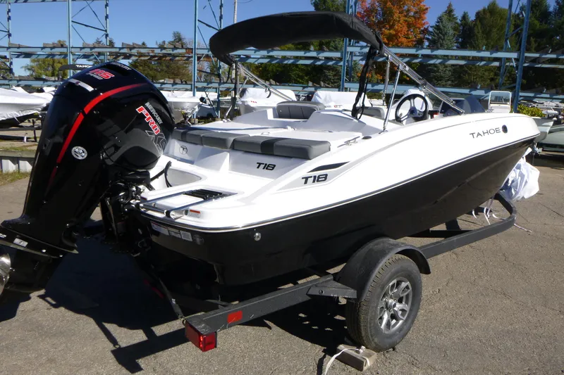 Slide: The Image of 2026 Tahoe T18 boat on trailer with powerful outboard motor. - 2