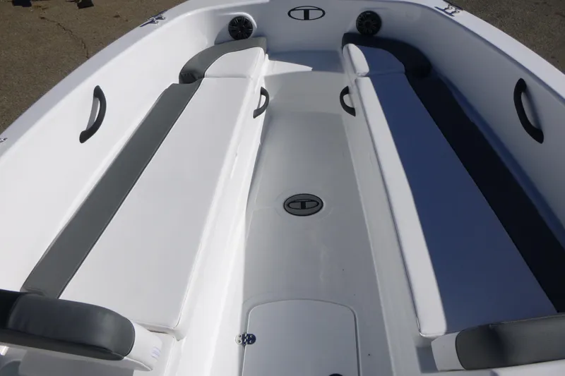 Slide: The Image of 2026 Tahoe T18 boat interior with gray and white seating, featuring sleek design and modern amenities. - 6