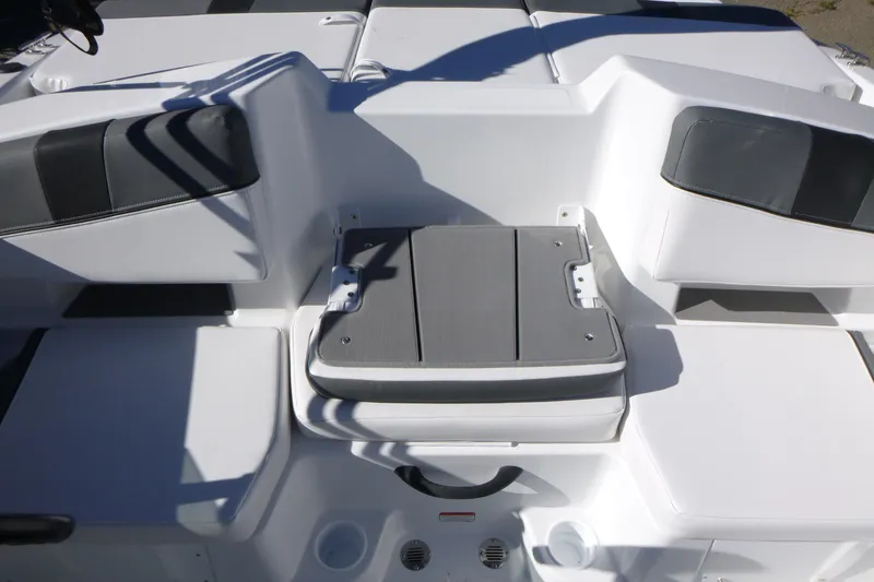Slide: The Image of 2026 Tahoe T18 boat interior with gray and white seating arrangement. - 9