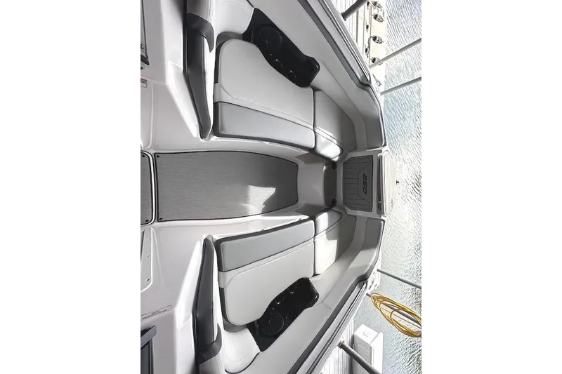 Slide: The Image of 2022 Yamaha AR250 boat interior with sleek seating and modern design. - 10