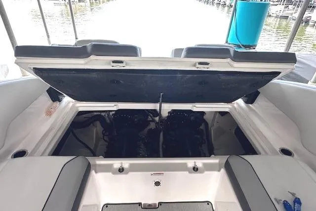 Slide: The Image of 2022 Yamaha Boats AR250 engine compartment with open hatch, showcasing dual engines. - 17