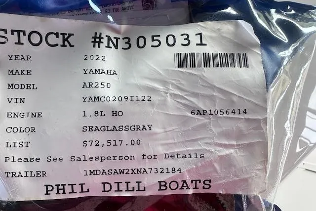 Slide: The Image of 2022 Yamaha AR250 boat details tag with price and specifications. - 33