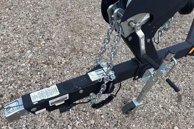 Slide: The Image of Trailer hitch of a 2022 Yamaha Boats AR250 on gravel surface. - 36