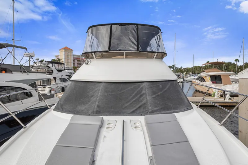 Slide: The Image of 2008 Meridian 408 Motoryacht docked at marina under clear blue sky. - 19