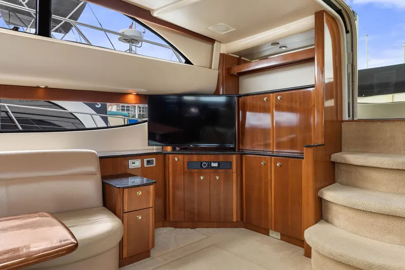 Slide: The Image of Luxurious interior of 2008 Meridian 408 Motoryacht with wood cabinetry and modern entertainment system. - 22