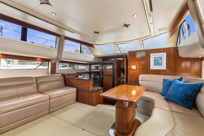 Slide: The Image of Luxurious interior of 2008 Meridian 408 Motoryacht with plush seating and elegant wood finishes. - 24