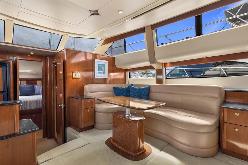 Slide: The Image of Luxurious interior of 2008 Meridian 408 Motoryacht with elegant seating and wood finishes. - 28
