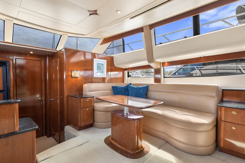 Slide: The Image of Luxurious interior of 2008 Meridian 408 Motoryacht with elegant seating and wood finishes. - 29
