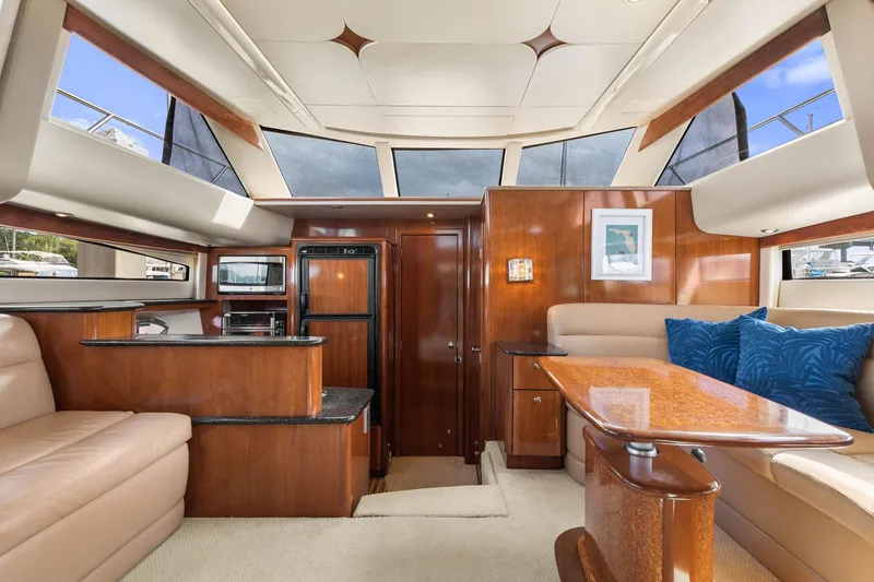 Slide: The Image of Luxurious interior of 2008 Meridian 408 Motoryacht with elegant wood finishes and plush seating. - 30
