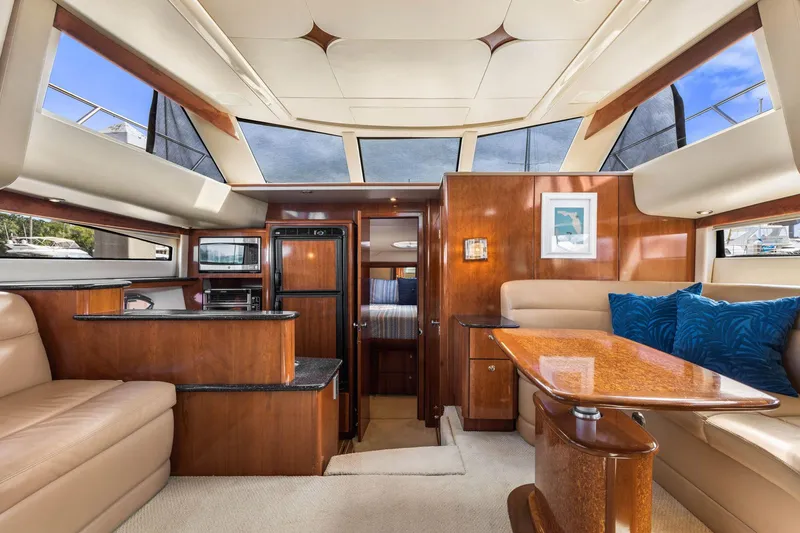 Slide: The Image of Luxurious interior of 2008 Meridian 408 Motoryacht with elegant wood finishes and plush seating. - 31