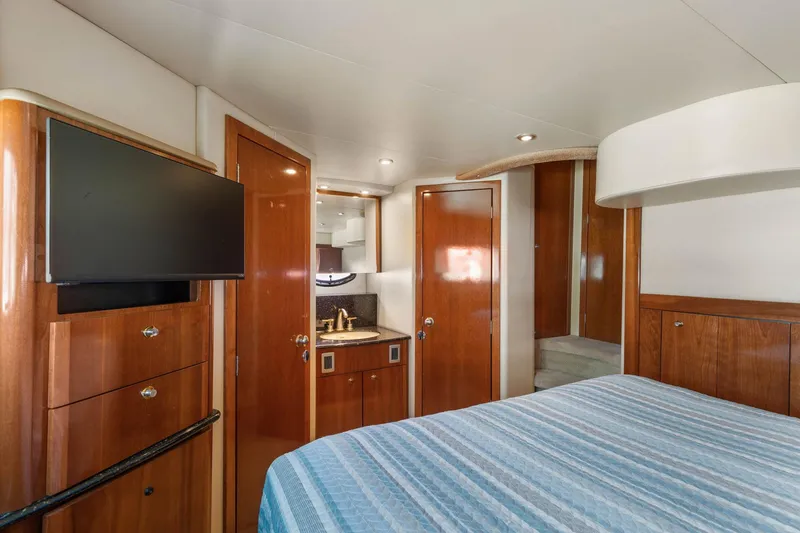 Slide: The Image of Luxurious interior of 2008 Meridian 408 Motoryacht with wood finishes and modern amenities. - 46