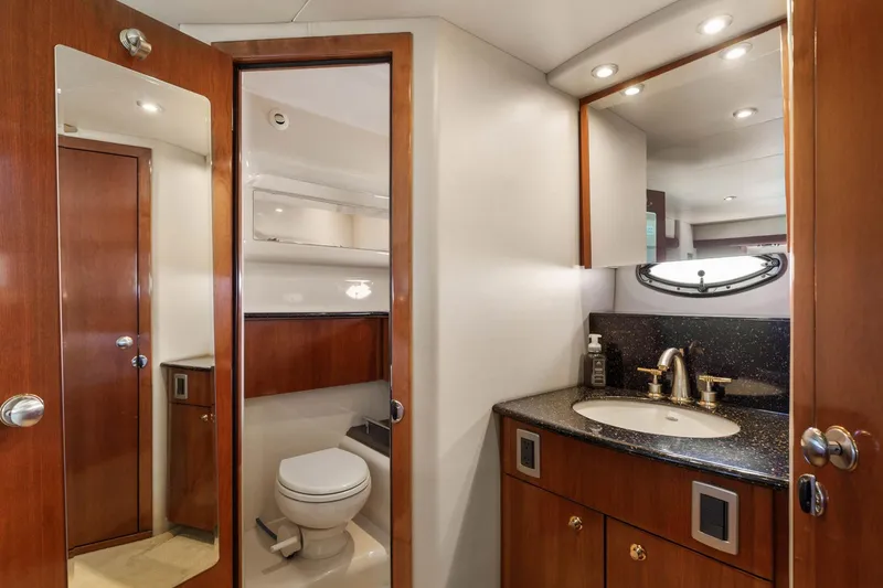 Slide: The Image of Luxurious bathroom in 2008 Meridian 408 Motoryacht with wood accents and modern fixtures. - 48
