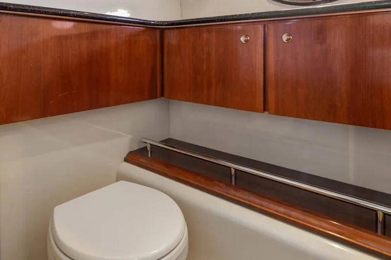Slide: The Image of Luxurious bathroom interior of 2008 Meridian 408 Motoryacht with wooden cabinetry. - 49