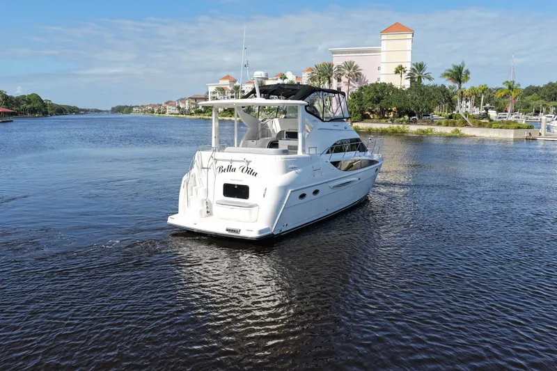 Slide: The Image of 2008 Meridian 408 Motoryacht cruising on a scenic river with lush surroundings. - 59