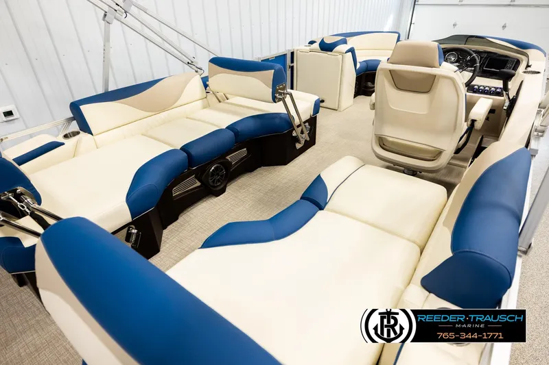 Slide: The Image of Luxurious 2026 Avalon LSZ QLS pontoon boat interior with blue and cream seating. - 12