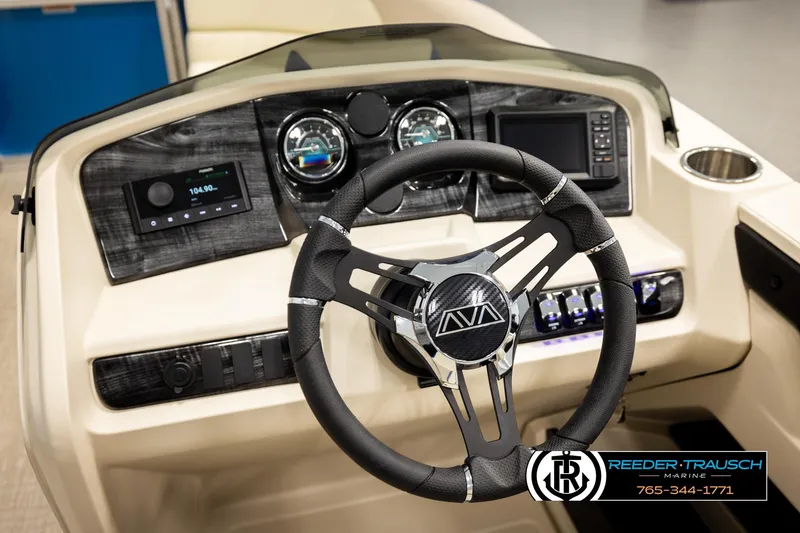 Slide: The Image of Steering wheel and dashboard of 2026 Avalon LSZ QLS boat, featuring modern controls and gauges. - 34