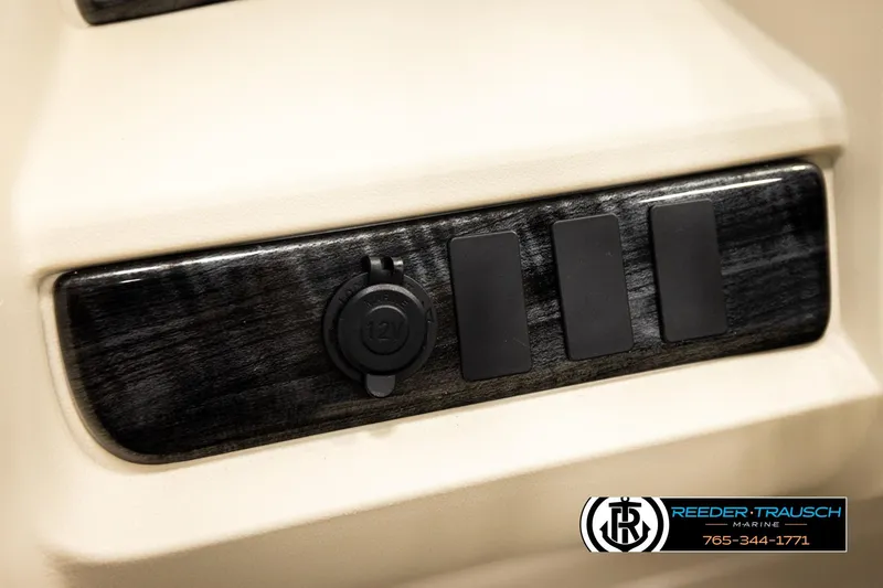 Slide: The Image of Control panel of 2026 Avalon LSZ QLS with 12V socket and switches. - 36