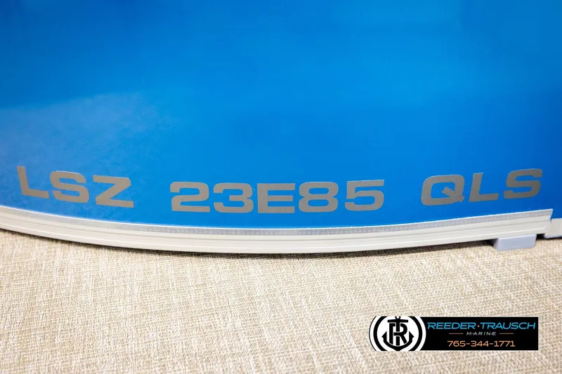 Slide: The Image of 2026 Avalon LSZ QLS boat with blue exterior and model details. - 48