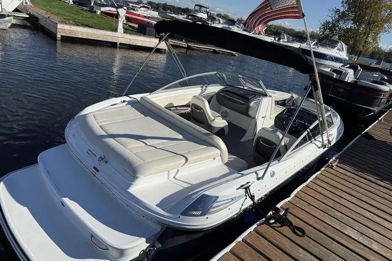 Slide: The Image of 2008 Cobalt 202 boat docked, featuring a sleek design and comfortable seating. - 1