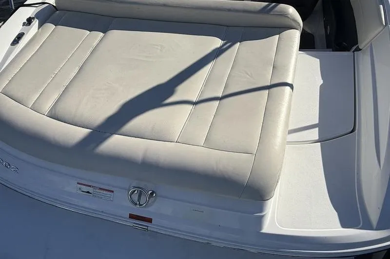 Slide: The Image of Rear view of a 2008 Cobalt 202 boat with cushioned seating. - 8