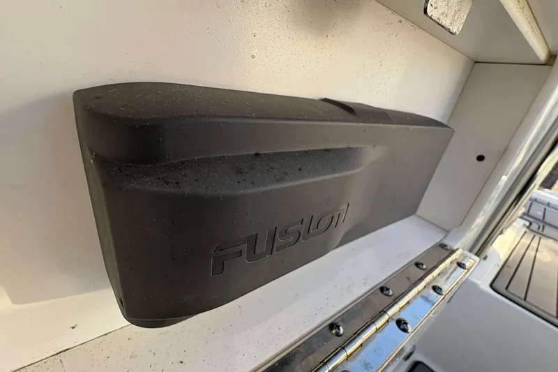 Slide: The Image of Black Fusion speaker on a 2020 Monterey M-65 boat, mounted on a white surface. - 15