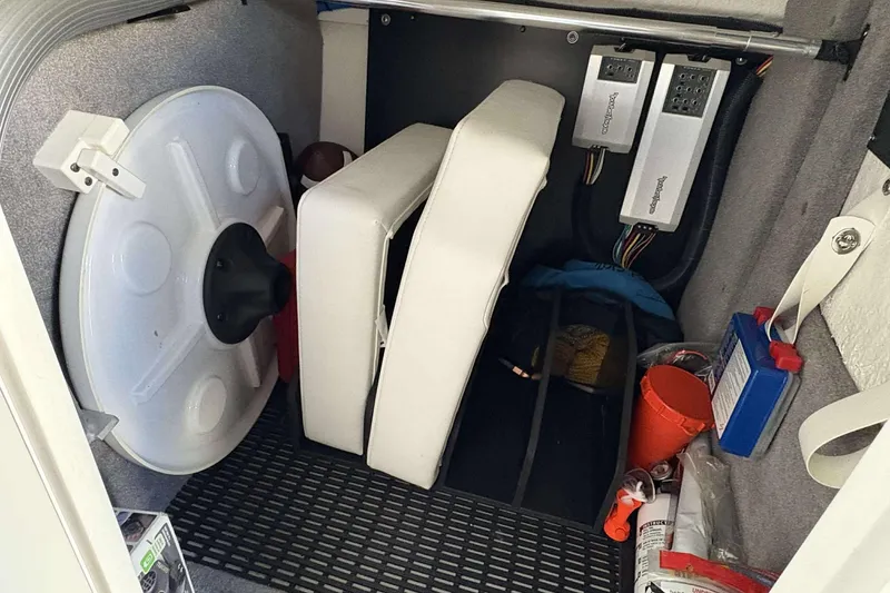 Slide: The Image of Storage compartment of 2020 Monterey M-65 boat with equipment and accessories. - 18