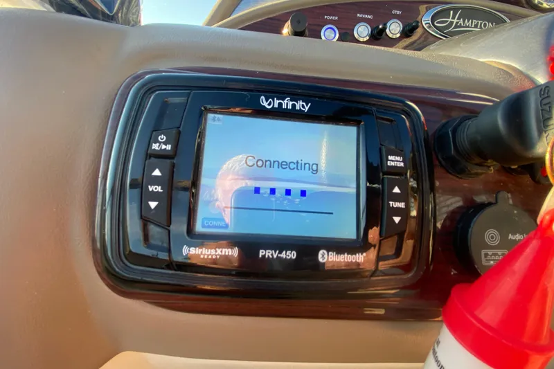 Slide: The Image of Infinity PRV-450 stereo system in 2018 Hampton 2485 SE boat, displaying "Connecting" screen. - 24