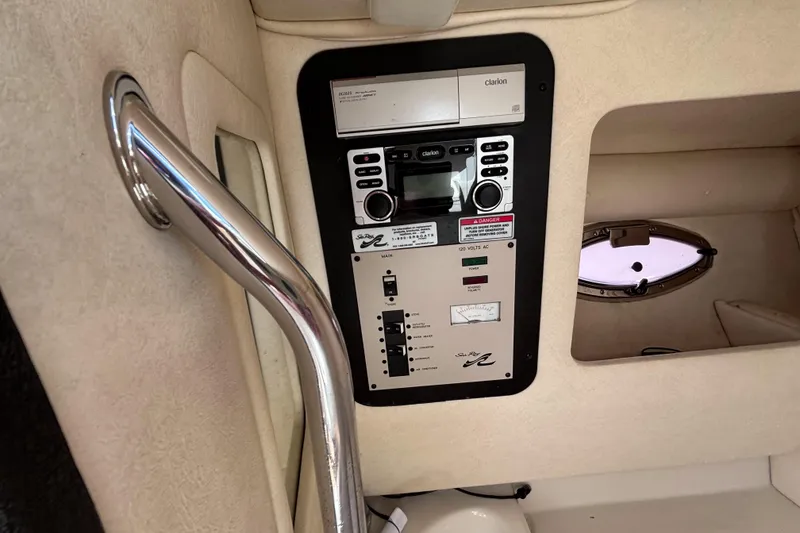 Slide: The Image of Control panel inside a 2006 Sea Ray 290 SLX boat cabin. - 33