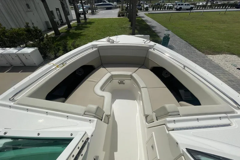 Slide: The Image of 2023 Boston Whaler 280 Vantage boat with spacious seating area and modern design. - 12