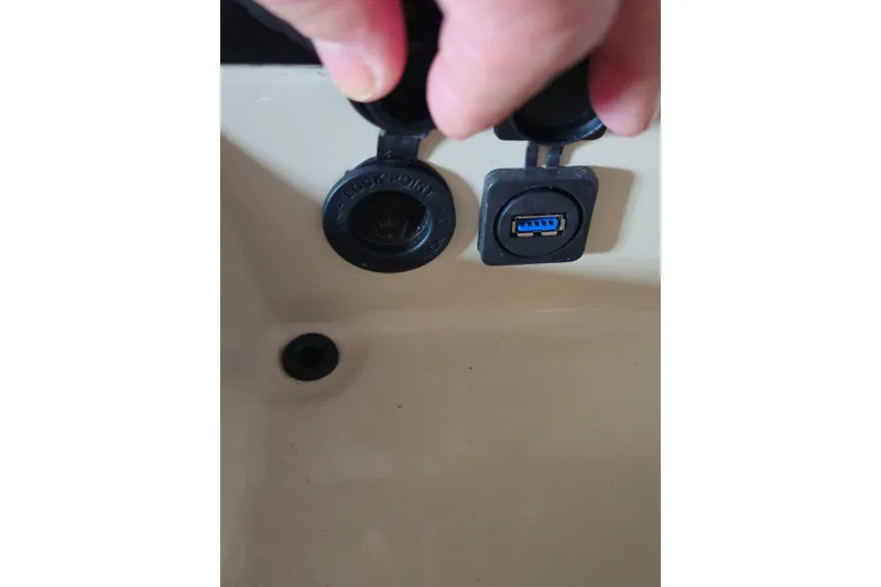 Slide: The Image of USB and power outlet on 2023 Boston Whaler 280 Vantage boat. - 22