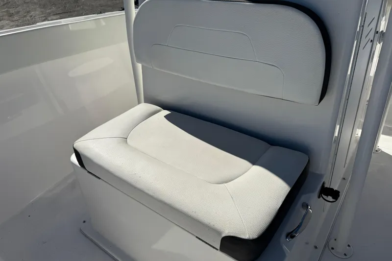 Slide: The Image of White cushioned boat seat on a 2023 Clearwater model. - 16