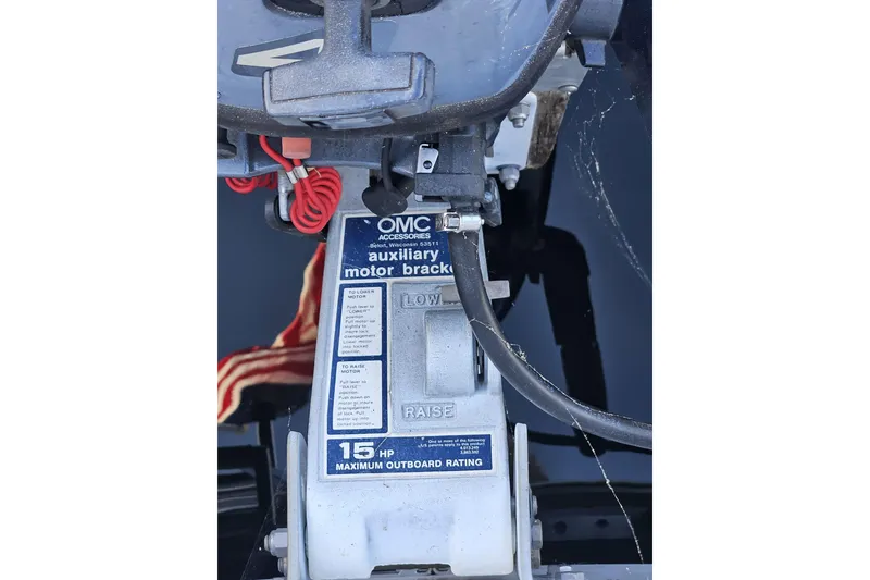Slide: The Image of OMC auxiliary motor bracket on 1981 Catalina Capri 25 sailboat, 15 HP rating. - 10