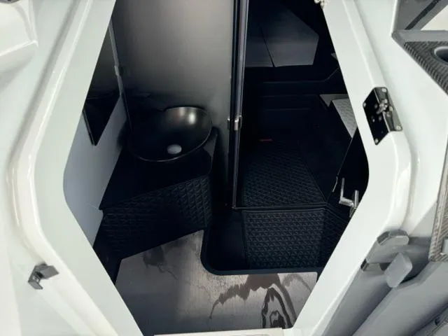 Slide: The Image of 2024 BRABUS Shadow 1000 ST interior cabin with modern sink and sleek design. - 19