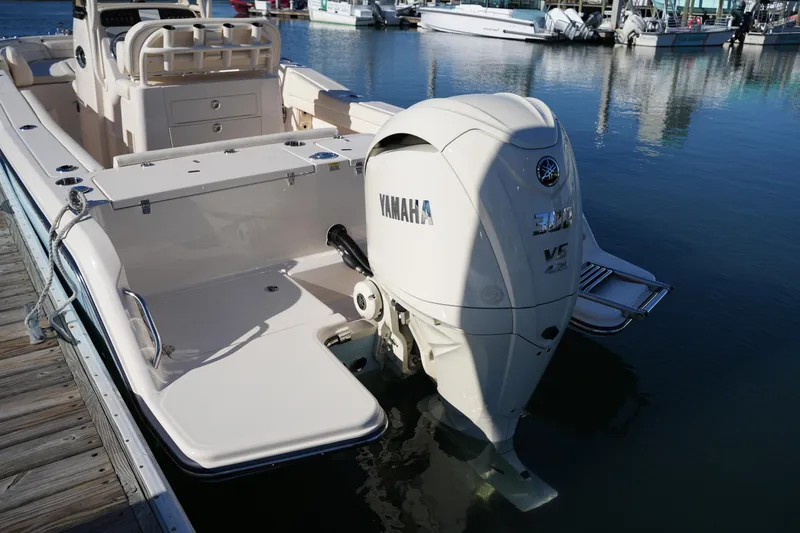 Slide: The Image of 2024 Grady-White Fisherman 236 boat with Yamaha V6 engine at dock. - 18