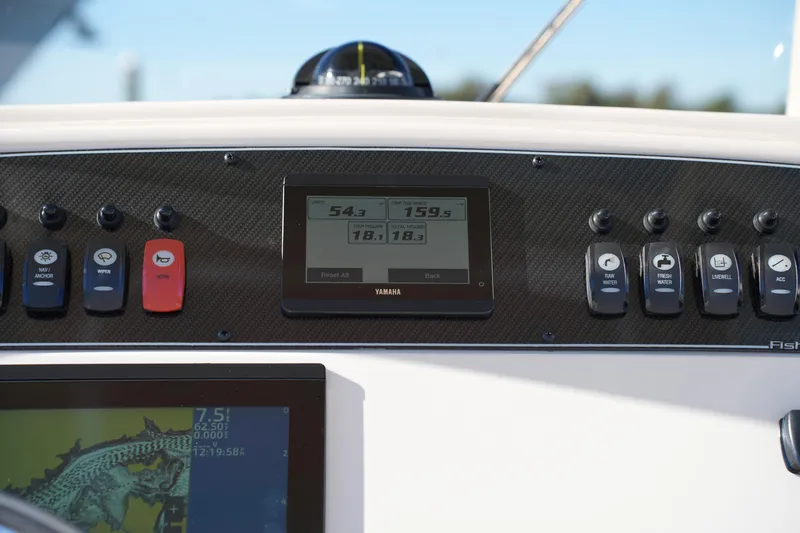 Slide: The Image of Dashboard of 2024 Grady-White Fisherman 236 boat with Yamaha display and controls. - 25