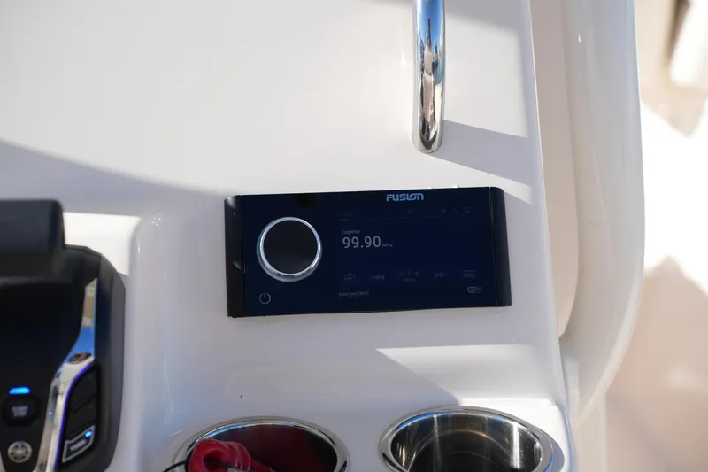 Slide: The Image of 2024 Grady-White Fisherman 236 boat console with Fusion stereo system. - 28