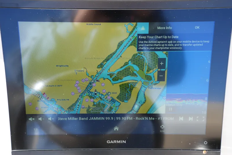Slide: The Image of Garmin marine chart display on 2024 Grady-White Fisherman 236 boat, showing navigation map. - 30